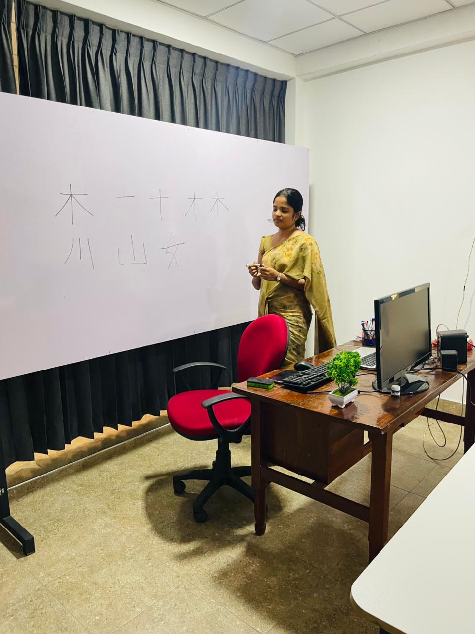 Instructor teaching Japanese